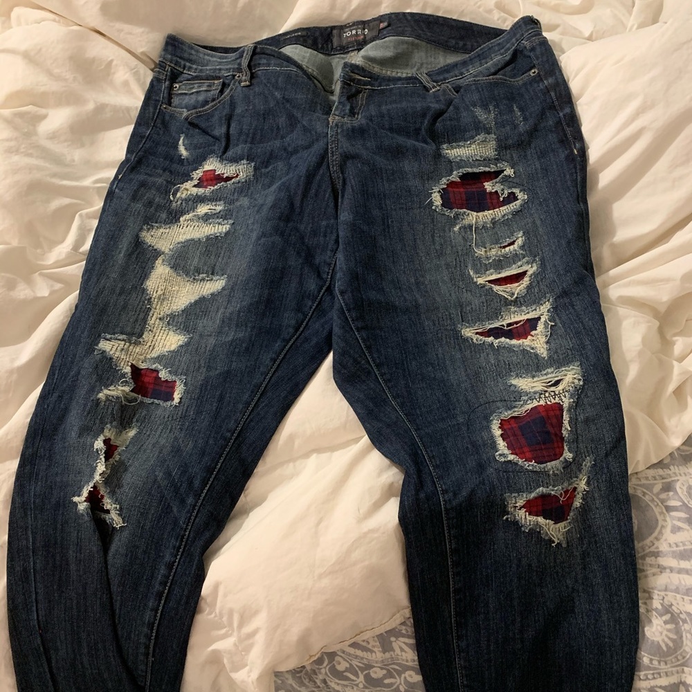 Red flannel blue jeans ripped